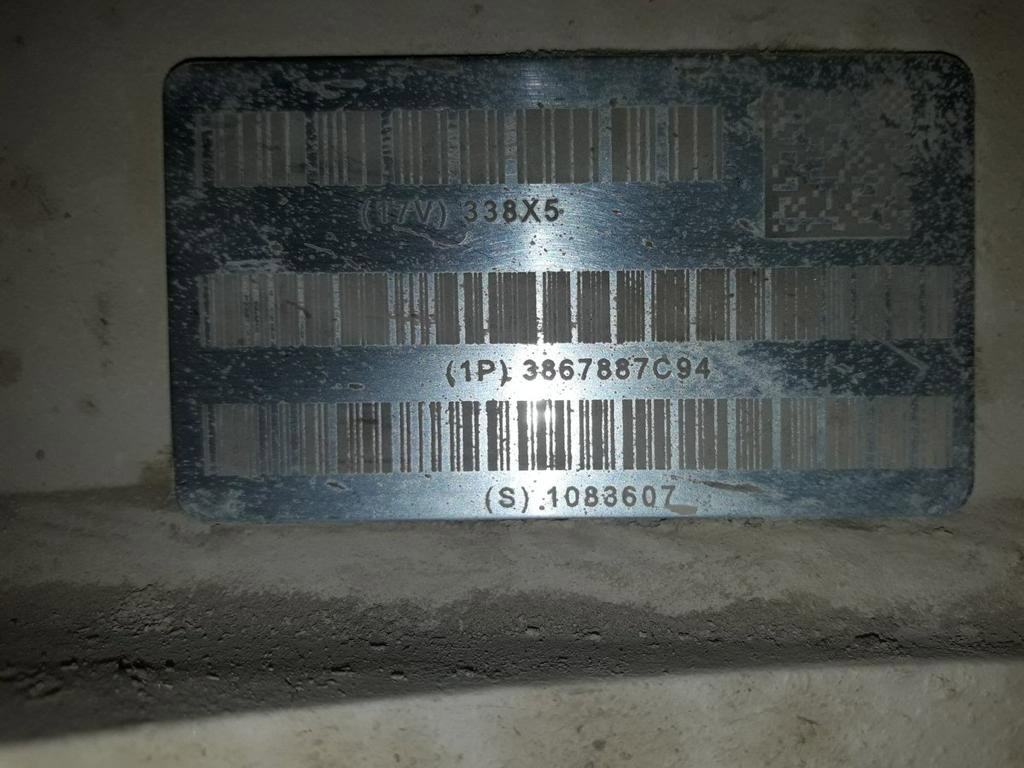 A barcoded serial plate